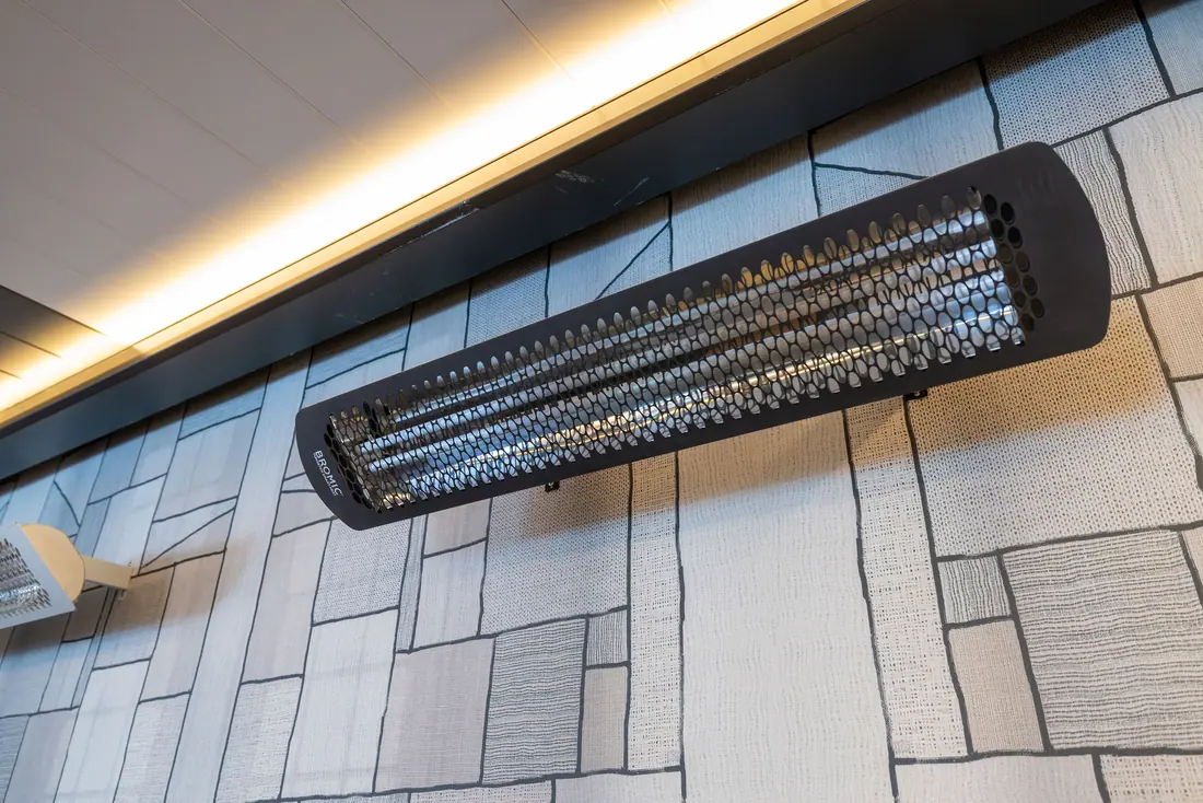 Electric radiant patio heater mounted overhead