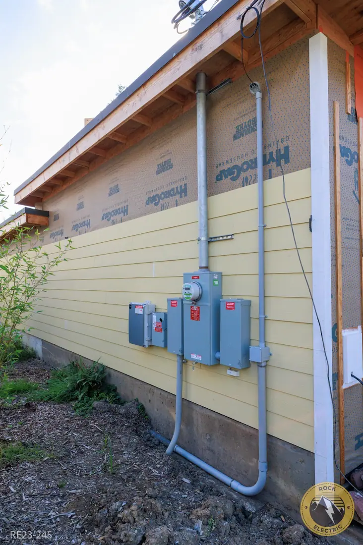 Exterior electrical service and conduit run during a remodel